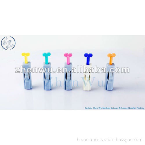 button activated safety lancet